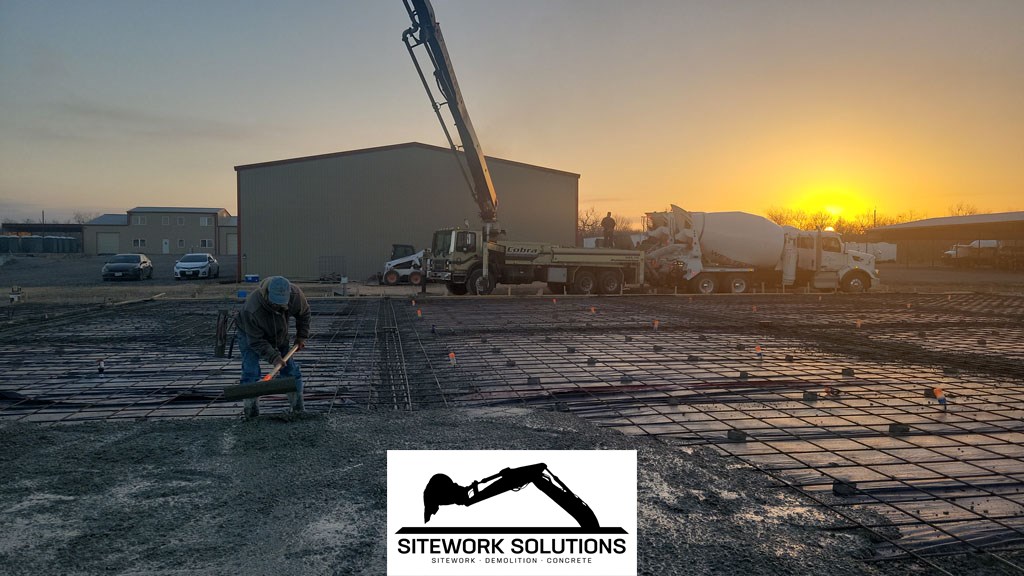 Mixing the concrete and workable consistency by Siteworks Solutions in San Antonio Texas